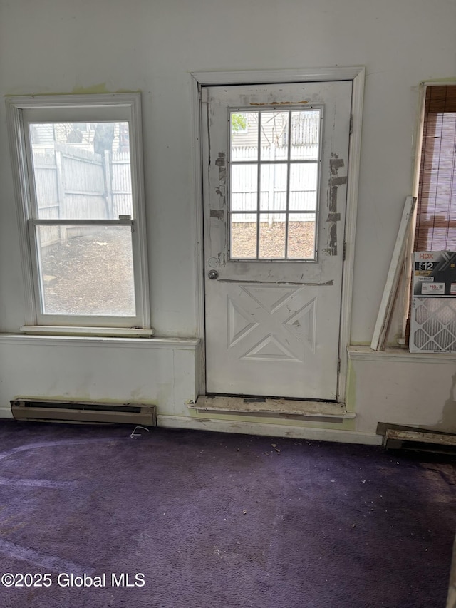 3 Osborne St, Albany, NY 12202 - entryway featuring a baseboard heating unit, a wealth of natural light, and carpet floors