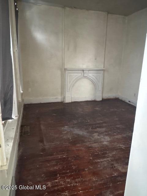 3 Osborne St, Albany, NY 12202 - unfurnished living room with dark wood-style flooring