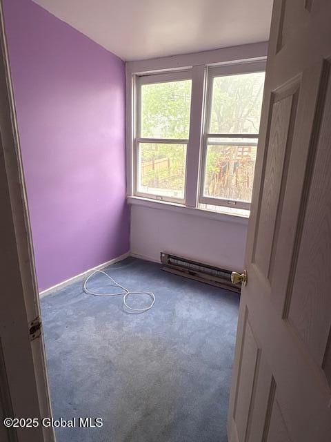 3 Osborne St, Albany, NY 12202 - unfurnished room featuring baseboards, carpet, and a baseboard radiator