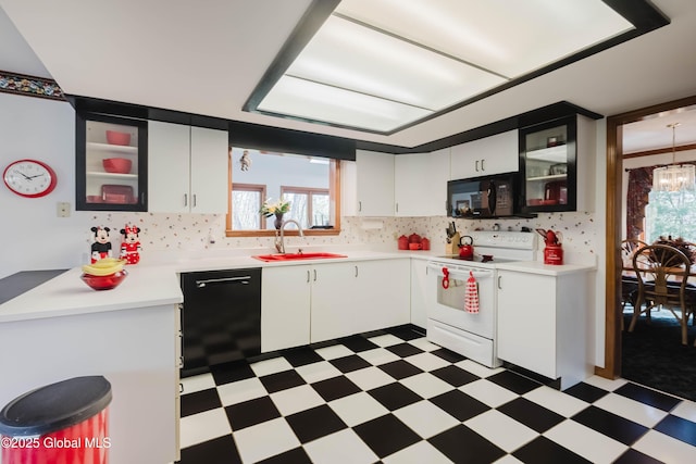 kitchen featuring a sink, light floors, black appliances, and light countertops