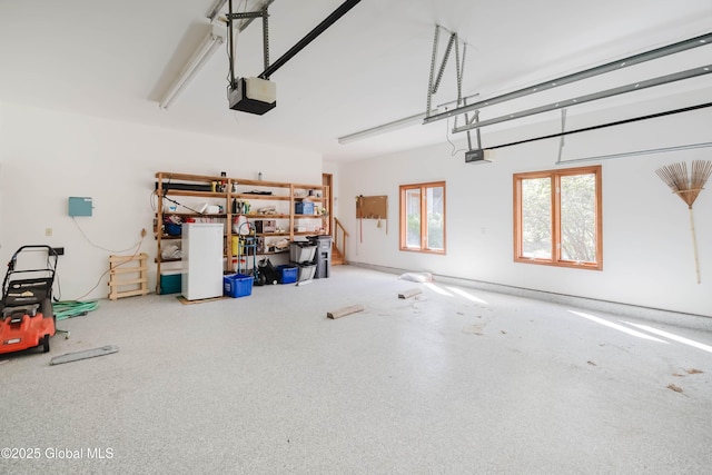 garage featuring a garage door opener
