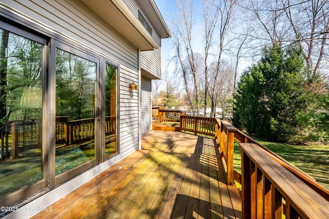 wooden deck featuring french doors