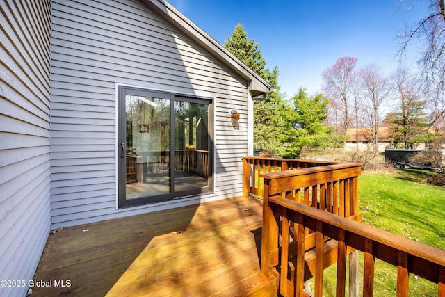 deck featuring a lawn