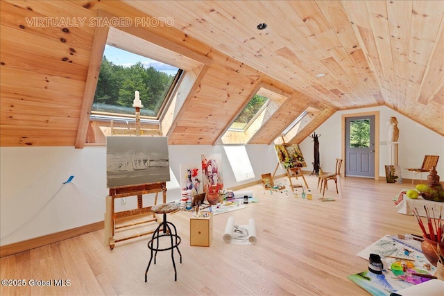 165 Vaughn Hill Rd, Middleburgh, NY 12122 - playroom with a skylight, wooden ceiling, wood finished floors, and lofted ceiling