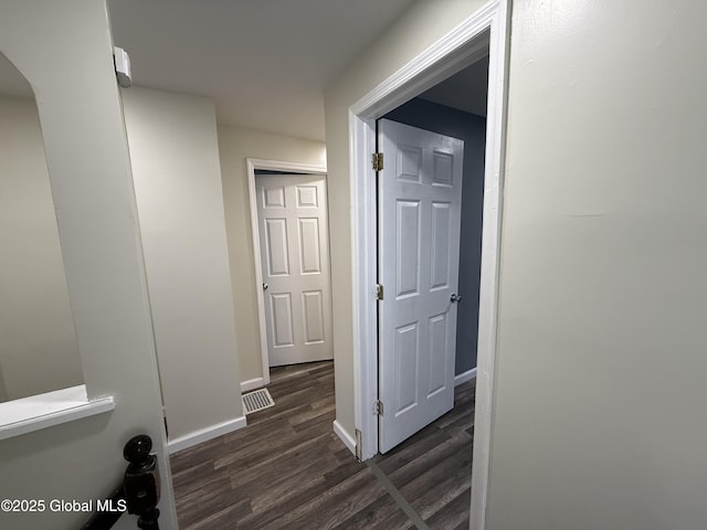 46 Slater St, Amsterdam, NY 12010 - hallway featuring dark wood-style floors and baseboards