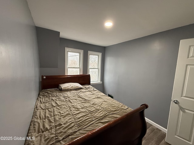 46 Slater St, Amsterdam, NY 12010 - bedroom with dark wood finished floors and baseboards