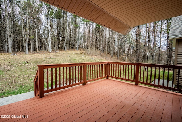 deck with a wooded view