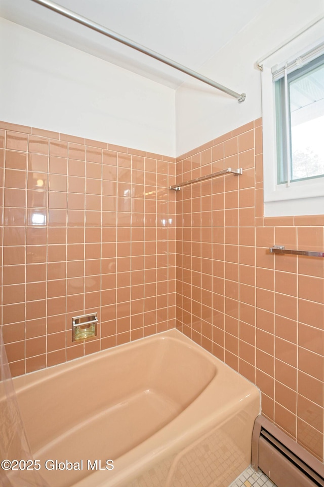 31 Tryon Ct, Albany, NY 12203 - bathroom with a baseboard radiator, tile walls, and  shower combination