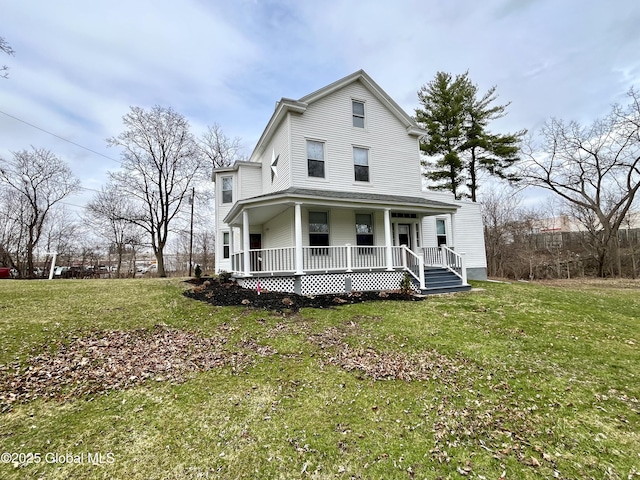 view of front facade featuring a front lawn and covered porch