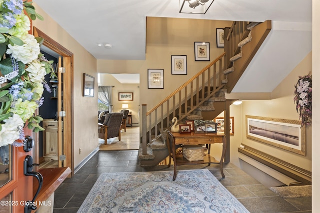 66 Schaeffer Rd, Berlin, NY 12138 - foyer with stone tile flooring and stairway