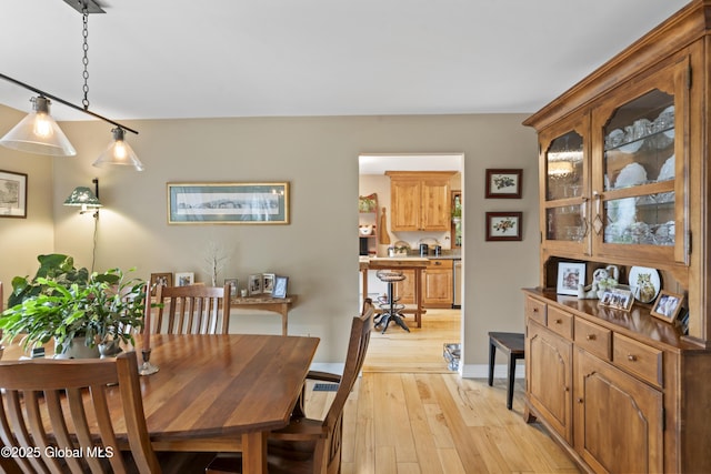 66 Schaeffer Rd, Berlin, NY 12138 - dining room with light wood-style floors and baseboards