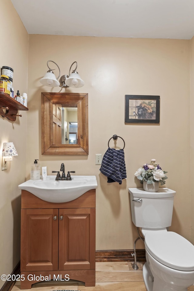 66 Schaeffer Rd, Berlin, NY 12138 - bathroom featuring vanity and wood finished floors