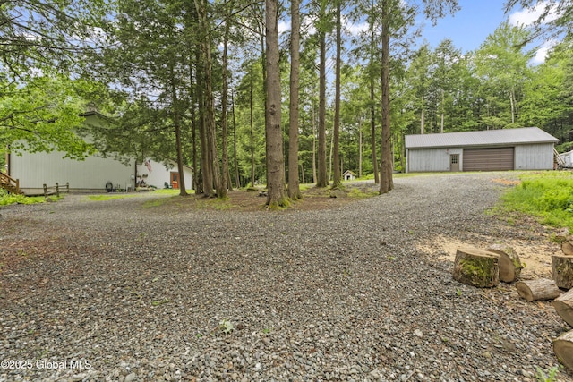 66 Schaeffer Rd, Berlin, NY 12138 - view of yard featuring an outdoor structure and a detached garage