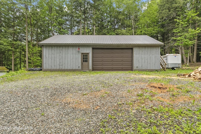 66 Schaeffer Rd, Berlin, NY 12138 - detached garage with view of wooded area