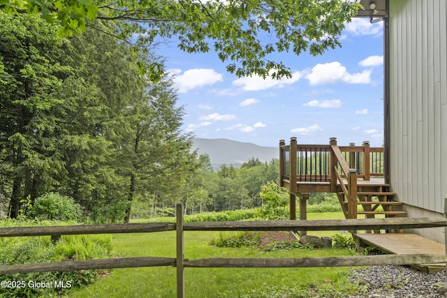 66 Schaeffer Rd, Berlin, NY 12138 - view of yard featuring stairs, a deck with mountain view, and a wooded view