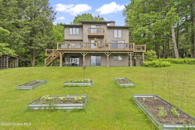 66 Schaeffer Rd, Berlin, NY 12138 - back of property featuring a vegetable garden, stairs, a wooden deck, and a yard