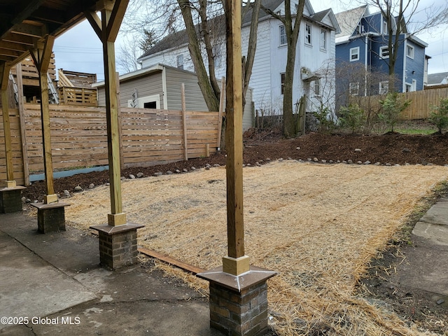 view of yard featuring fence