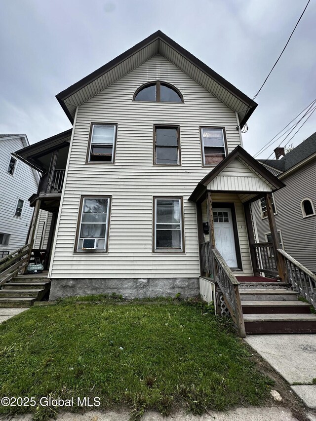 44 Storrie St, Amsterdam, NY 12010 - view of front of house with a front lawn