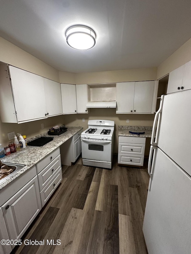 44 Storrie St, Amsterdam, NY 12010 - kitchen with white appliances, dark wood-type flooring, white cabinetry, and light stone counters