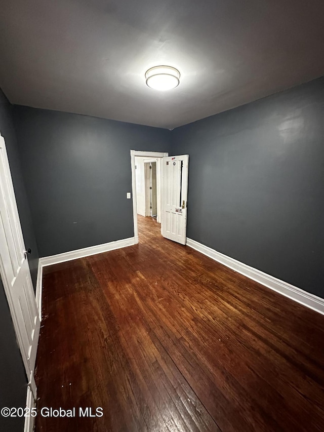 44 Storrie St, Amsterdam, NY 12010 - spare room with wood-type flooring and baseboards