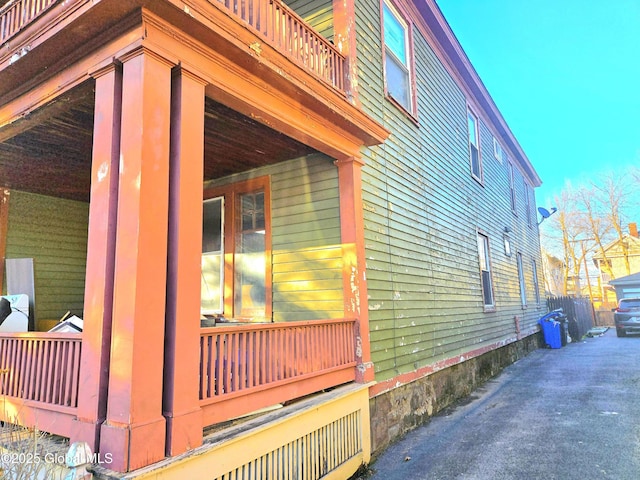 15 Kenyon Ct, Utica, NY 13501 - view of property exterior featuring a balcony