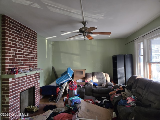 15 Kenyon Ct, Utica, NY 13501 - living room featuring a ceiling fan and a brick fireplace