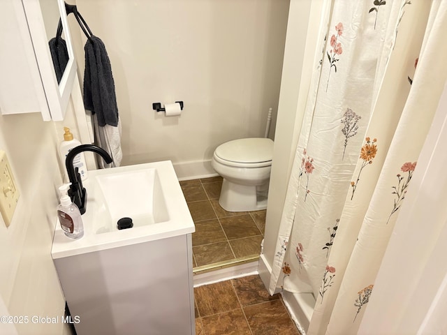 bathroom with toilet, baseboards, tile patterned flooring, a shower with shower curtain, and vanity