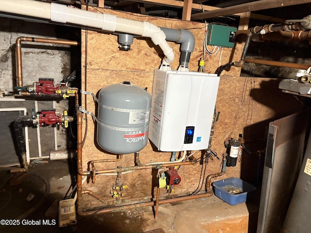 utility room with tankless water heater