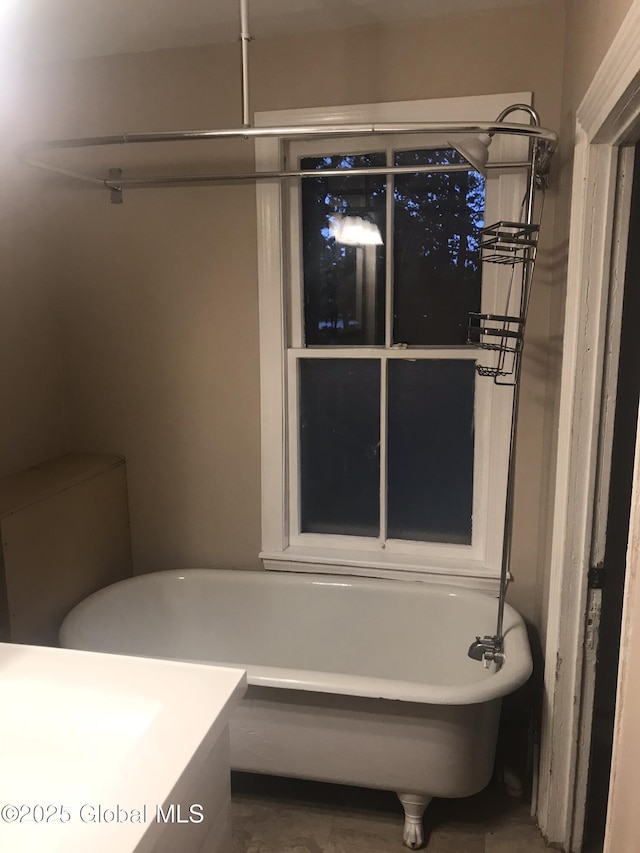 full bathroom with a washtub