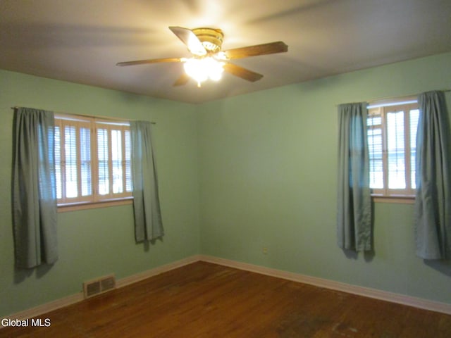 16 Knickerbocker Rd, Scotia, NY 12302 - unfurnished room featuring ceiling fan and dark wood-style floors