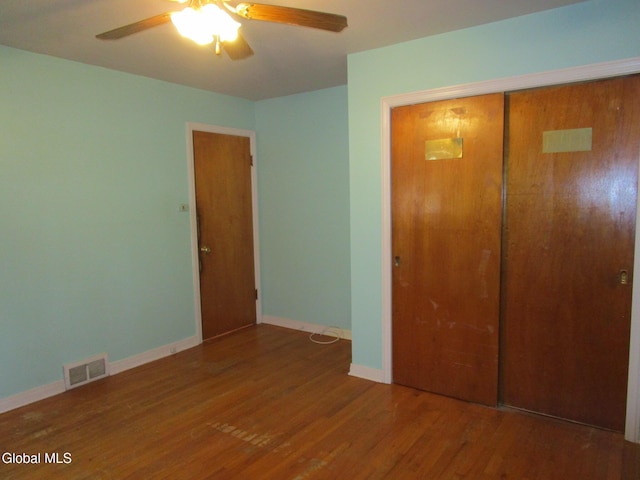 16 Knickerbocker Rd, Scotia, NY 12302 - unfurnished bedroom with a closet, wood finished floors, and a ceiling fan