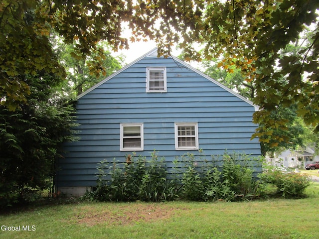 16 Knickerbocker Rd, Scotia, NY 12302 - view of home's exterior with a yard