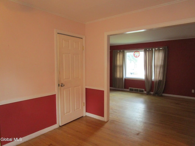 16 Knickerbocker Rd, Scotia, NY 12302 - spare room featuring wood finished floors and crown molding