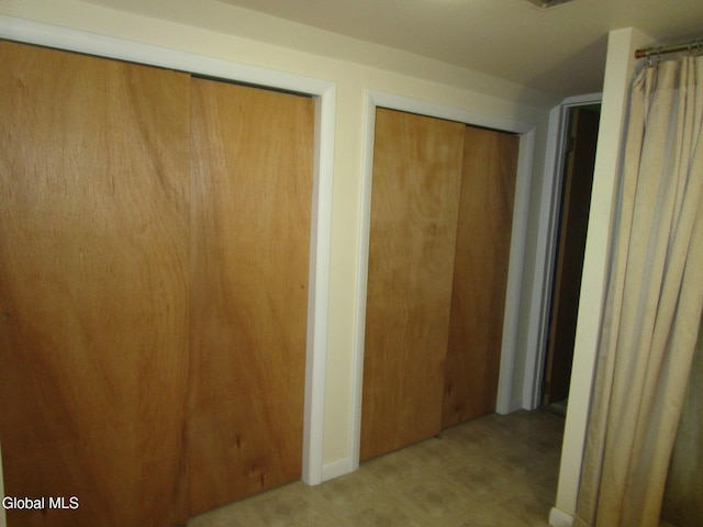16 Knickerbocker Rd, Scotia, NY 12302 - unfurnished bedroom featuring two closets