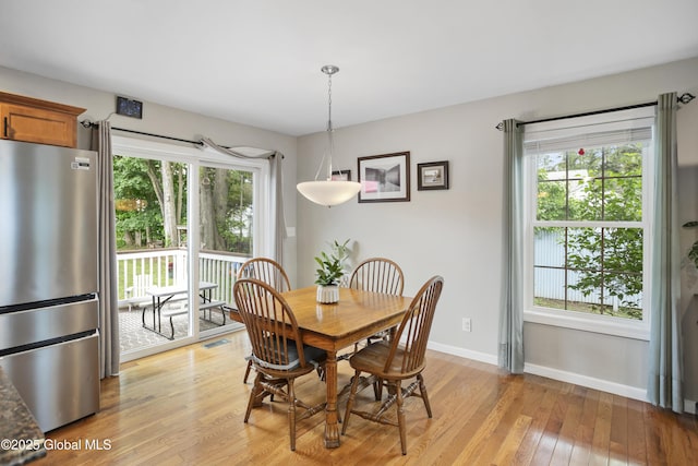 9 Barton Ave, Fort Edward, NY 12828 - dining room with light wood-style flooring and baseboards