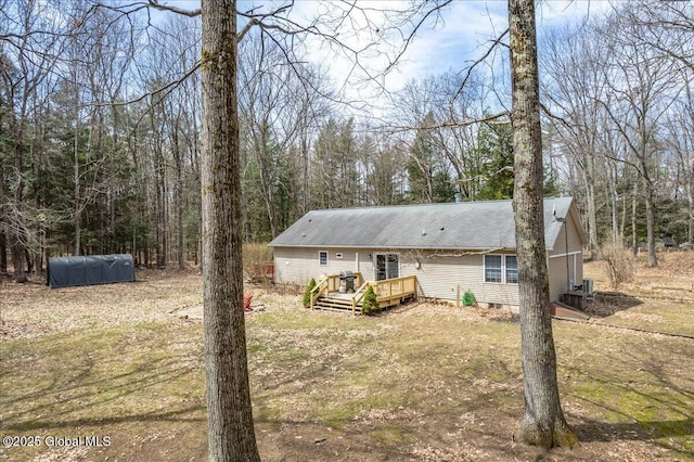 view of front of property with crawl space and a wooden deck