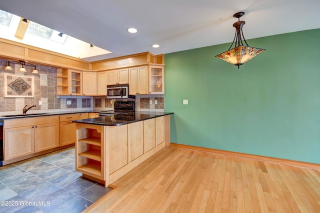 132 County Highway 152 Unit C, Northville, NY 12134 - kitchen featuring open shelves, light brown cabinetry, black electric range, stainless steel microwave, and a peninsula