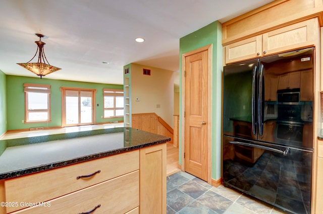 132 County Highway 152 Unit C, Northville, NY 12134 - kitchen featuring freestanding refrigerator, light brown cabinetry, dark stone counters, recessed lighting, and hanging light fixtures