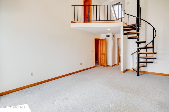 132 County Highway 152 Unit C, Northville, NY 12134 - staircase featuring carpet and a high ceiling