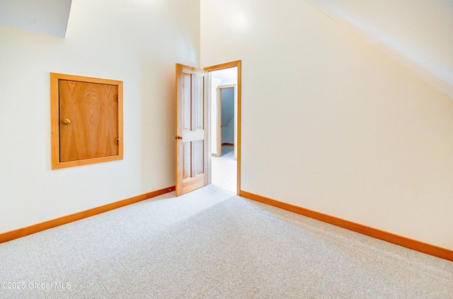 132 County Highway 152 Unit C, Northville, NY 12134 - spare room featuring carpet flooring and a towering ceiling