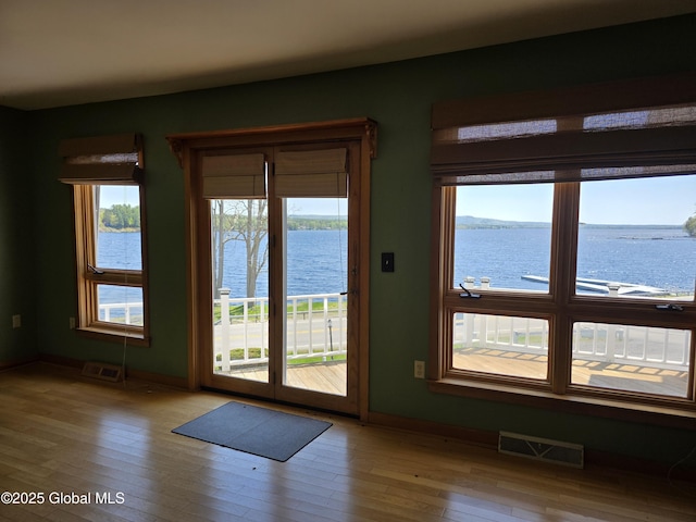 132 County Highway 152 Unit C, Northville, NY 12134 - entryway featuring a water view and wood-type flooring