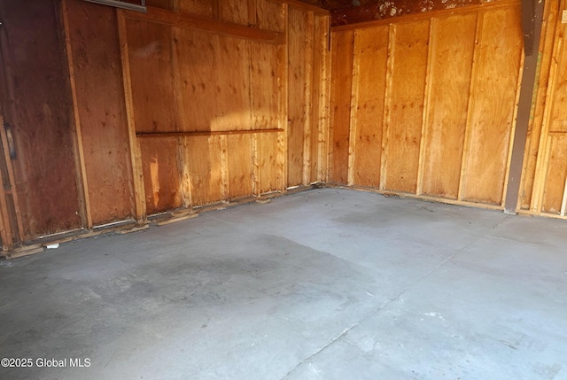 empty room with concrete flooring