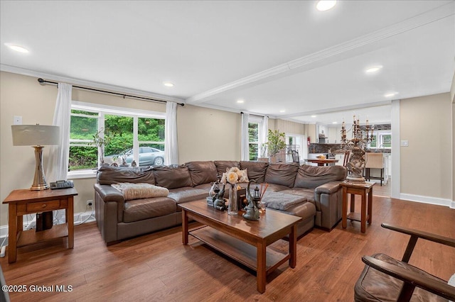458 Central Ave, Niskayuna, NY 12304 - living room featuring wood finished floors, recessed lighting, baseboards, and ornamental molding