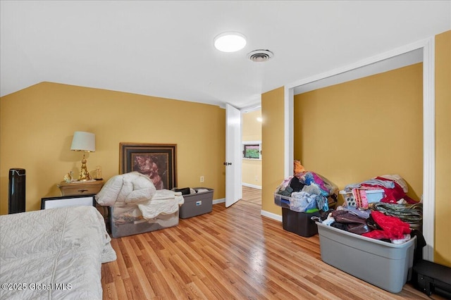 458 Central Ave, Niskayuna, NY 12304 - bedroom featuring wood finished floors and lofted ceiling