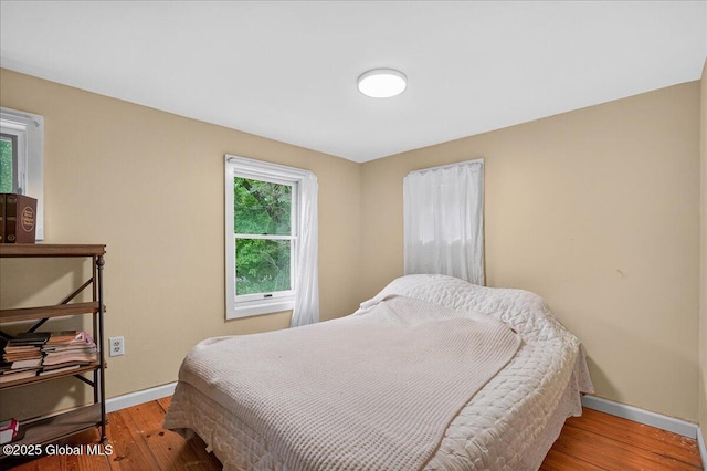 458 Central Ave, Niskayuna, NY 12304 - bedroom featuring baseboards and wood-type flooring