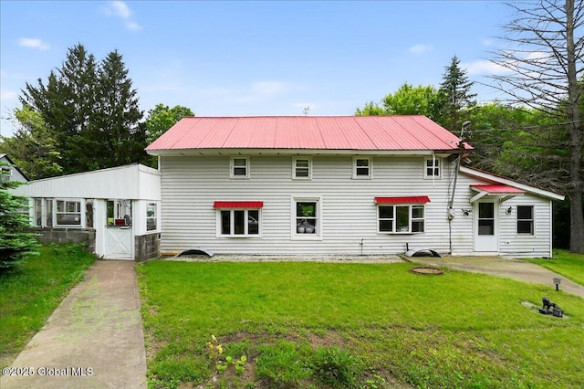 458 Central Ave, Niskayuna, NY 12304 - rear view of property featuring a lawn and metal roof