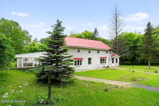 458 Central Ave, Niskayuna, NY 12304 - view of side of home featuring a yard and metal roof