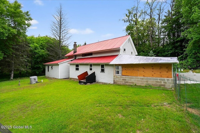 458 Central Ave, Niskayuna, NY 12304 - rear view of house with metal roof and a chimney