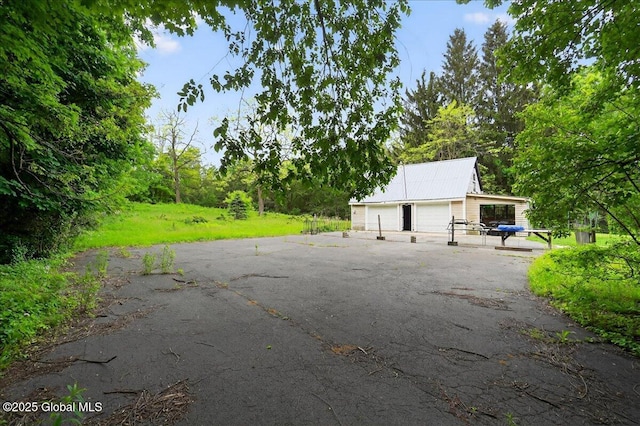 458 Central Ave, Niskayuna, NY 12304 - view of patio / terrace with a detached garage
