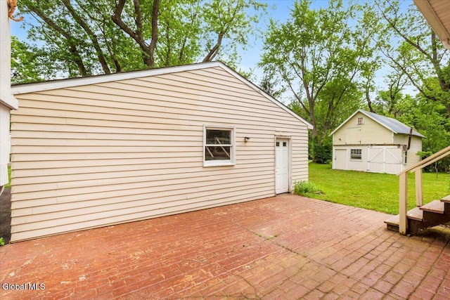 104 Euclid Ave, Altamont, NY 12009 - view of patio / terrace featuring an outbuilding